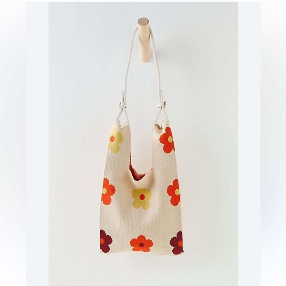 The Lucca Make It Mini Clutch is a knitted bag with a unique unstructured design